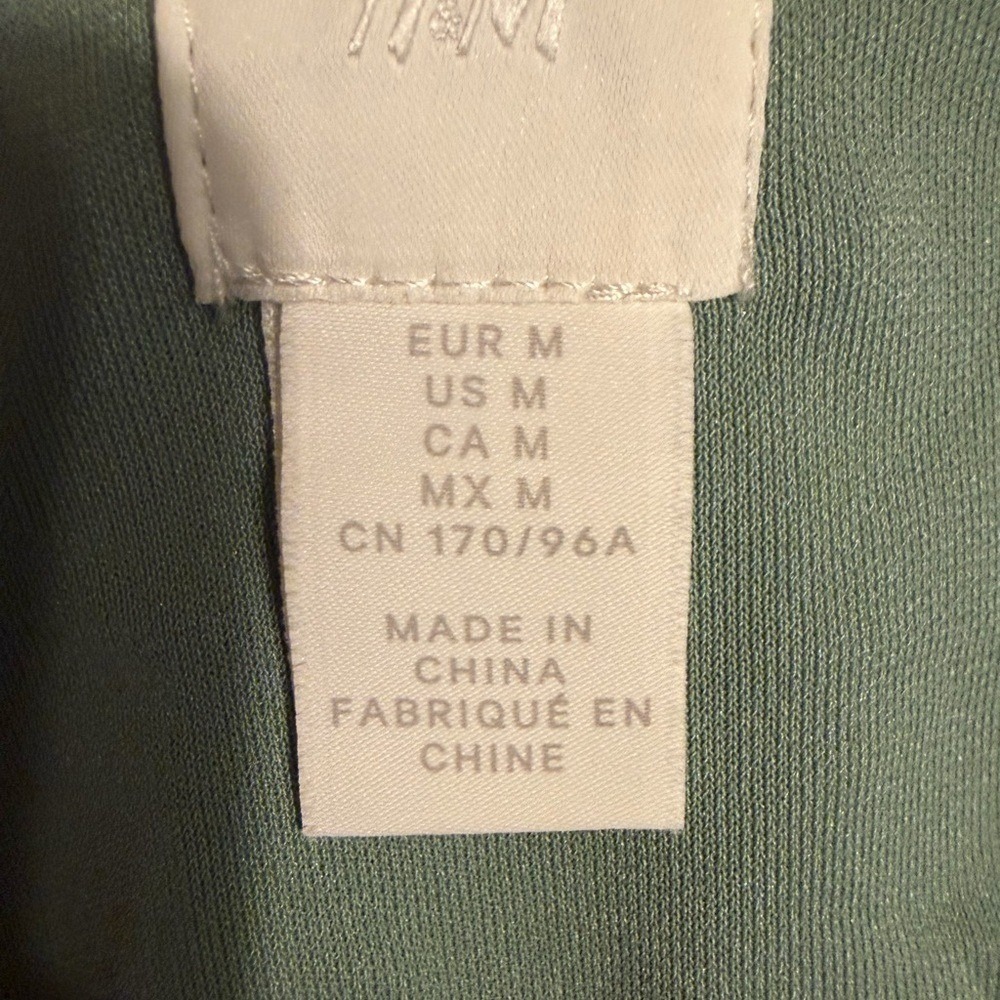 H&M Sage Green Slip Dress featuring adjustable spaghetti straps and a side slit - Picture 4 of 8